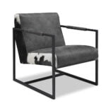 Cliff stóll frá Het Anker, með nautaskinni og svörtum fótum í gráum Moro lit.